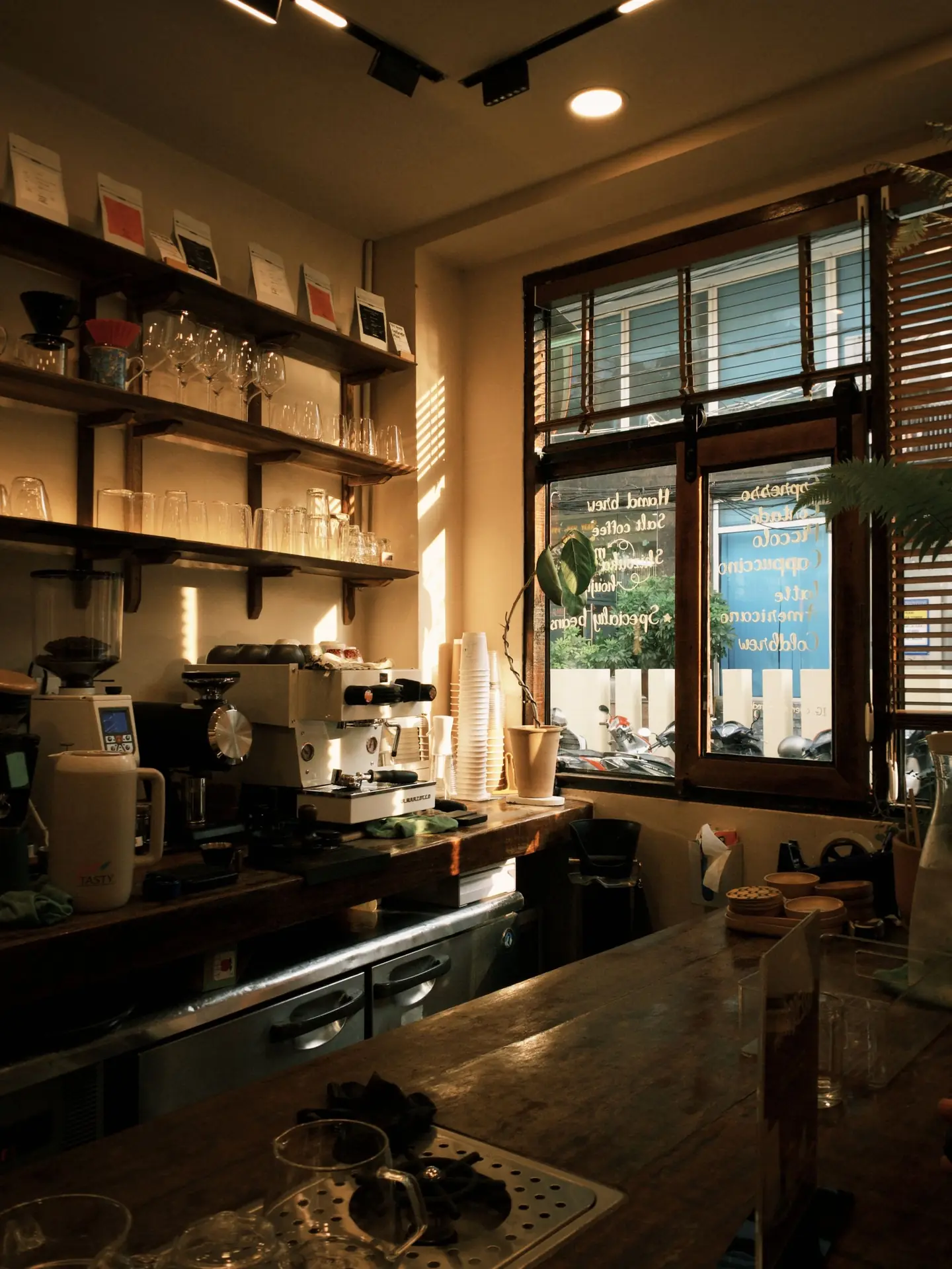 A warm café interior in the evening